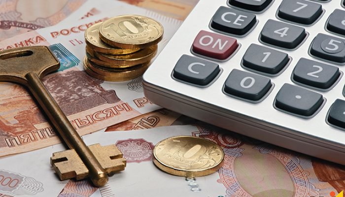 Rubles, calculator and key. Russian money. real estate concept